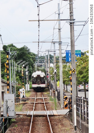 Fukushima Kotsu Iizaka Line Train running near Hanamizuzaka Station Fukushima Kotsu Iizaka Line Train running near Hanamizuzaka Station 106283068