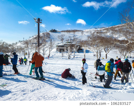 People preparing to ski at a ski resort (Niseko, Hokkaido) People preparing to ski at a ski resort (Niseko, Hokkaido) 106283527