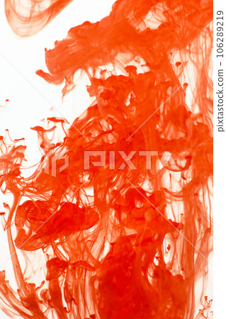 Colorful orange ink swirling in water isolated on white background. Abstract background Colorful orange ink swirling in water isolated on white background. Abstract background 106289219