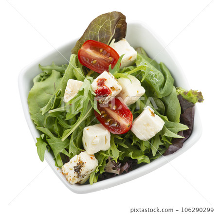 Spring Salad with Feta Cheese Isolated on White Background. Spring Salad with Feta Cheese Isolated on White Background. 106290299