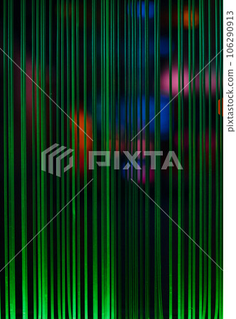 Green light lines and colored spots from fiber optic wires, computer communications idea, selective focus, blur, dark background, vertical frame Green light lines and colored spots from fiber optic wires, computer communications idea, selective focus, blur, dark background, vertical frame 106290913