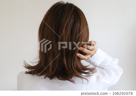 Back view of a woman Damaged hair Back view of a woman Damaged hair 106292078