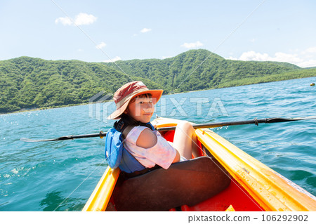 girl enjoying kayaking girl enjoying kayaking 106292902