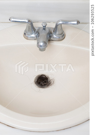 Cleaning from stuck hair sink 106293525