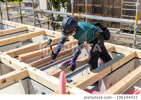 Construction of a new house, the foundation and the draw Construction of a new house, the foundation and the draw 106294415
