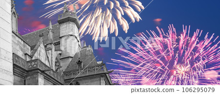 Celebratory fireworks over the Great gothic church of Saint Germain l Auxerrois, Paris, France 106295079