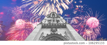 Celebratory fireworks over the Great gothic church of Saint Germain l Auxerrois, Paris, France 106295133