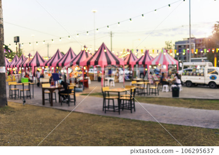 Blur image of flea market and food fair in Chiang mai city of Thailand. 106295637