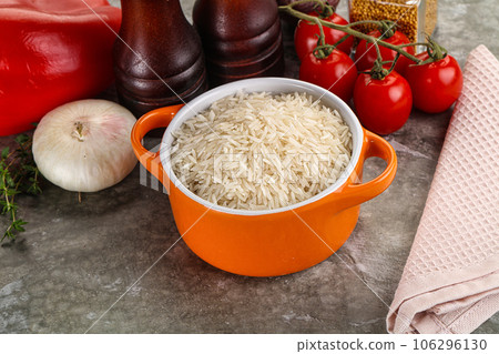 Raw delicous basmati rice heap 106296130