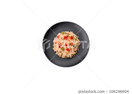 Delicious boiled rice with vegetables peppers, carrots, peas and asparagus beans Delicious boiled rice with vegetables peppers, carrots, peas and asparagus beans 106296604