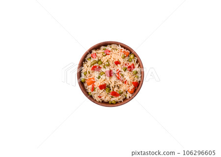 Delicious boiled rice with vegetables peppers, carrots, peas and asparagus beans Delicious boiled rice with vegetables peppers, carrots, peas and asparagus beans 106296605