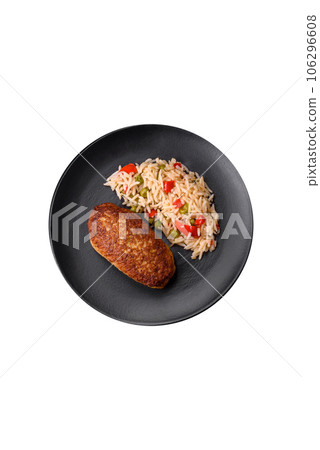 Delicious fried cutlets or meatballs of minced fish with rice 106296608