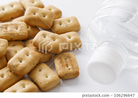 Emergency hard bread and bottled water Emergency hard bread and bottled water 106296647