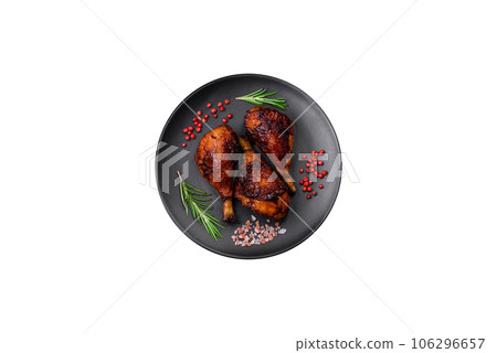 Delicious grilled chicken legs with spices and herbs in teriyaki sauce 106296657