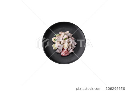 Delicious salad with boiled beef tongue, quail eggs, tomatoes and cucumber 106296658