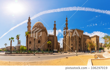 The Mosque-Madrassa of Sultan Hassan panoramic view, main islamic place of visit in Cairo, Egypt The Mosque-Madrassa of Sultan Hassan panoramic view, main islamic place of visit in Cairo, Egypt 106297019