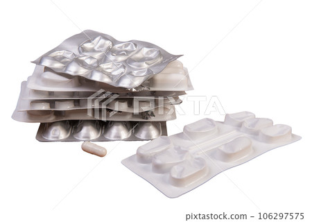 some blister packs of medicines 106297575