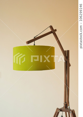 a lamp in home against white wall  106299146