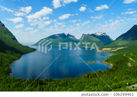 Beautiful classic Norwegian summer landscape in the month of July. mighty mountains meadows, sea 106299461