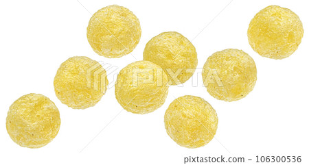 Falling corn balls isolated on white background with clipping path 106300536