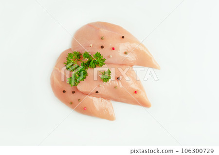 Raw chicken meat.Chicken breast Fillets.Raw fresh chicken fillet light background with fresh herbs.Food for retail.Procurement for designers.Ogranic food,healthy eating.Food concept.Top view.Close up. Raw chicken meat.Chicken breast Fillets.Raw fresh chicken fillet light background with fresh herbs.Food for retail.Procurement for designers.Ogranic food,healthy eating.Food concept.Top view.Close up. 106300729