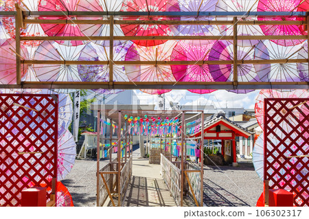 Colorful wind chimes and Japanese umbrellas at Beskoe Shrine, Nagoya 106302317