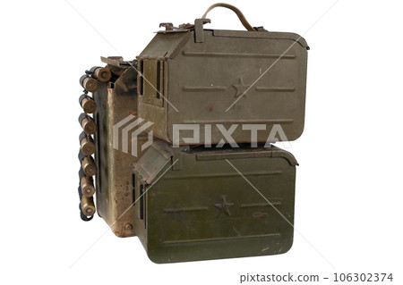 Ammo box with ammunition belt and 14.5mm cartridges for a 14.5mm KPVT heavy machine gun used by the former Soviet Union isolated on white background. 106302374