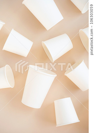 Cardboard cups for coffee or tea flat lay on neutral background. Cardboard cups for coffee or tea flat lay on neutral background. 106303059