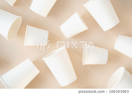 Cardboard cups for coffee or tea flat lay on neutral background. Cardboard cups for coffee or tea flat lay on neutral background. 106303063