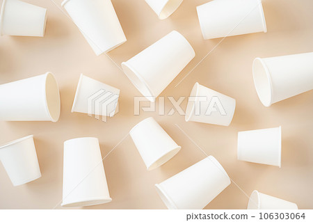 Cardboard cups for coffee or tea flat lay on neutral background. 106303064