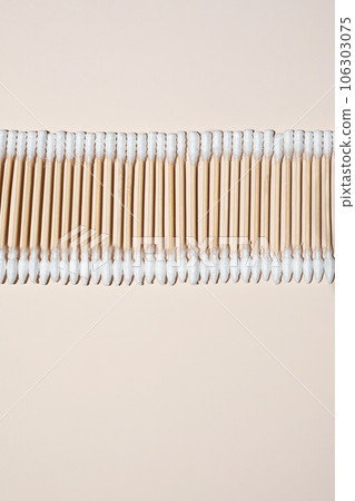Bamboo ear sticks layout. Cotton swabs for sustainability lifestyles. 106303075
