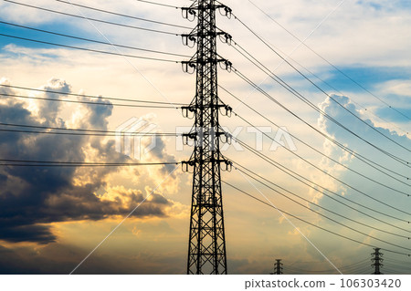 Transmission towers and cumulonimbus clouds in the summer afternoon and evening sky c-2 High saturation contrast 106303420