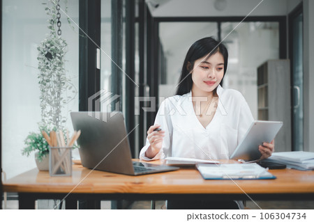 Woman using modern pad gadget at home browsing Internet or shopping, happy satisfied young female client surf web read news or chat on tablet device, technology concept 106304734
