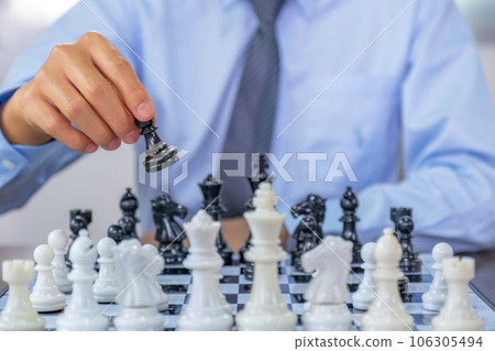 hand moves chess with strategy and tactic to win enemy, play battle on board game, business opportunity competition strategic challenge concept hand moves chess with strategy and tactic to win enemy, play battle on board game, business opportunity competition strategic challenge concept 106305494