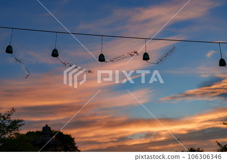 Dusk and wind chimes Dusk and wind chimes 106306346