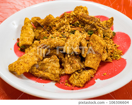 Deep fried squid breaded and seafood with Typhoon Shelter Style Deep fried squid breaded and seafood with Typhoon Shelter Style 106306604