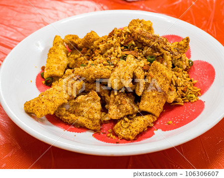 Deep fried squid breaded and seafood with Typhoon Shelter Style Deep fried squid breaded and seafood with Typhoon Shelter Style 106306607
