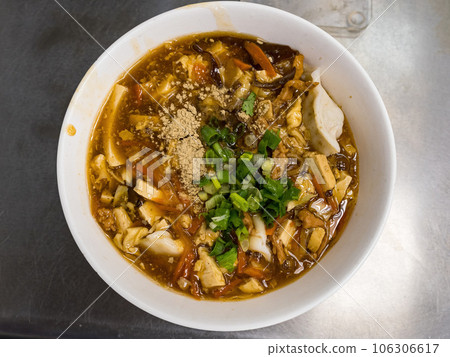Dumplings in sour and spicy soup Dumplings in sour and spicy soup 106306617