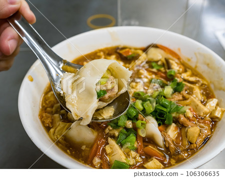 Dumplings in sour and spicy soup Dumplings in sour and spicy soup 106306635