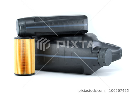Car oil filter and motor oil can over a white Car oil filter and motor oil can over a white 106307435