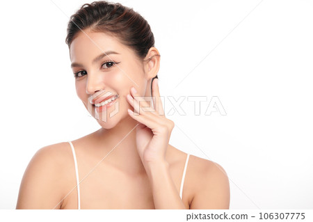 Beautiful young asian woman with clean fresh skin on white background, Face care, Facial treatment, Cosmetology, beauty and spa, Asian women portrait. Beautiful young asian woman with clean fresh skin on white background, Face care, Facial treatment, Cosmetology, beauty and spa, Asian women portrait. 106307775