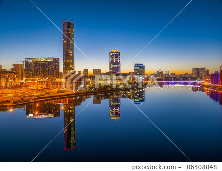 Yekaterinburg city and pond aerial panoramic view at summer or early autumn night. Night city in the early autumn or summer. 106308048