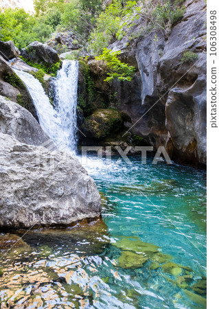 A beautiful mountain gorge with a river and a waterfall. Sapadere Canyon is 750 meters long and 400 meters high. This is an interesting place for all nature lovers. June 2023 Alanya-Antalya, Turkey 106308498