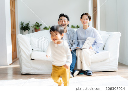 3 year old boy playing house in the kitchen 106308924