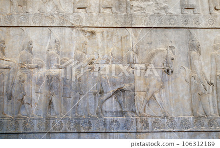 Ancient wall with bas-relief with assyrian foreign ambassadors with gifts and donations, Persepolis, Iran Ancient wall with bas-relief with assyrian foreign ambassadors with gifts and donations, Persepolis, Iran 106312189