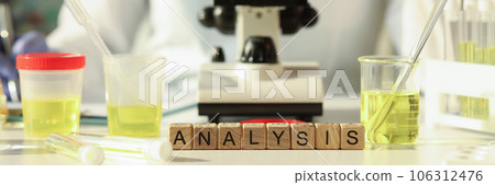Analysis is written on wooden cubes, close-up 106312476