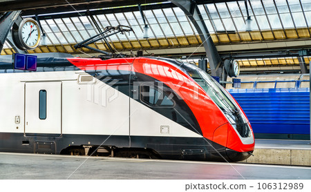 Modern passenger train at Zurich Main Station in Switzerland Modern passenger train at Zurich Main Station in Switzerland 106312989