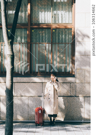 Woman calling on the road 106314662