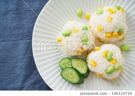 Corn and edamame rice balls Corn and edamame rice balls 106314738
