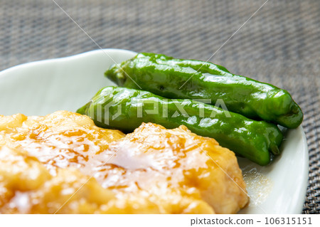 Shishito peppers served with teriyaki conger pike. Shishito peppers served with teriyaki conger pike. 106315151